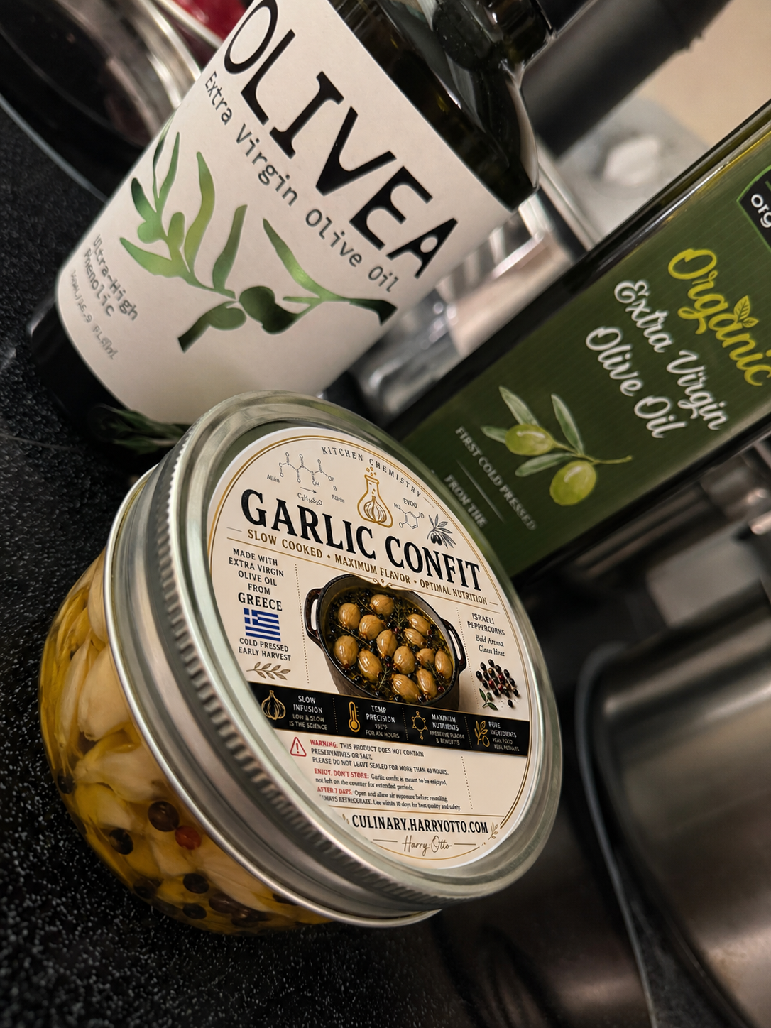 Garlic confit retail jar with olive oil bottles